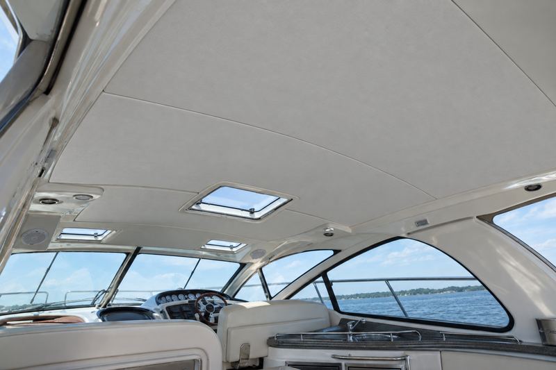 The same cabin with a new smooth light grey foam-backed headliner